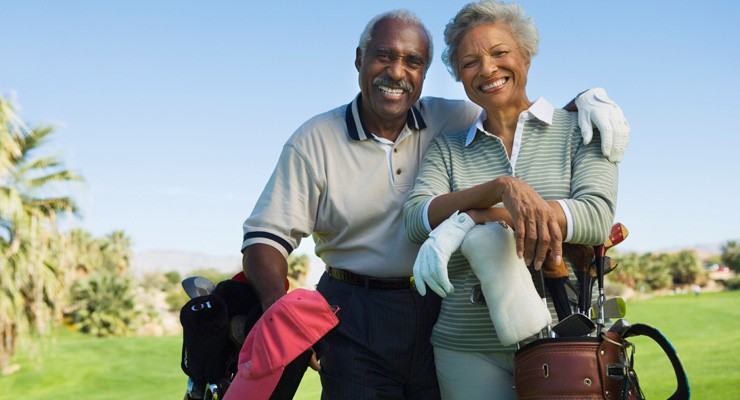 man and woman on golf course