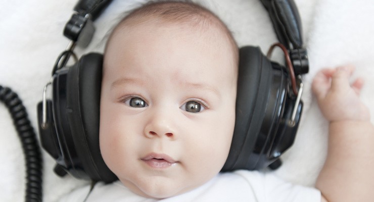 small baby with big headphones on
